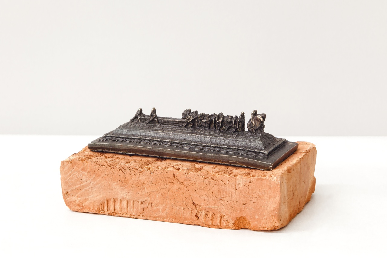 Jaime Lauriano, “Monumento às Bandeiras,” 2016, cast in brass and melted cartridges of ammunition used by the Military Police and Brazilian Armed Forces, set on a red brick base; a scale replica of Victor Brecheret’s granite “Monumento às Bandeiras” (1921–54), which stands in Ibirapuera Park, São Paulo.